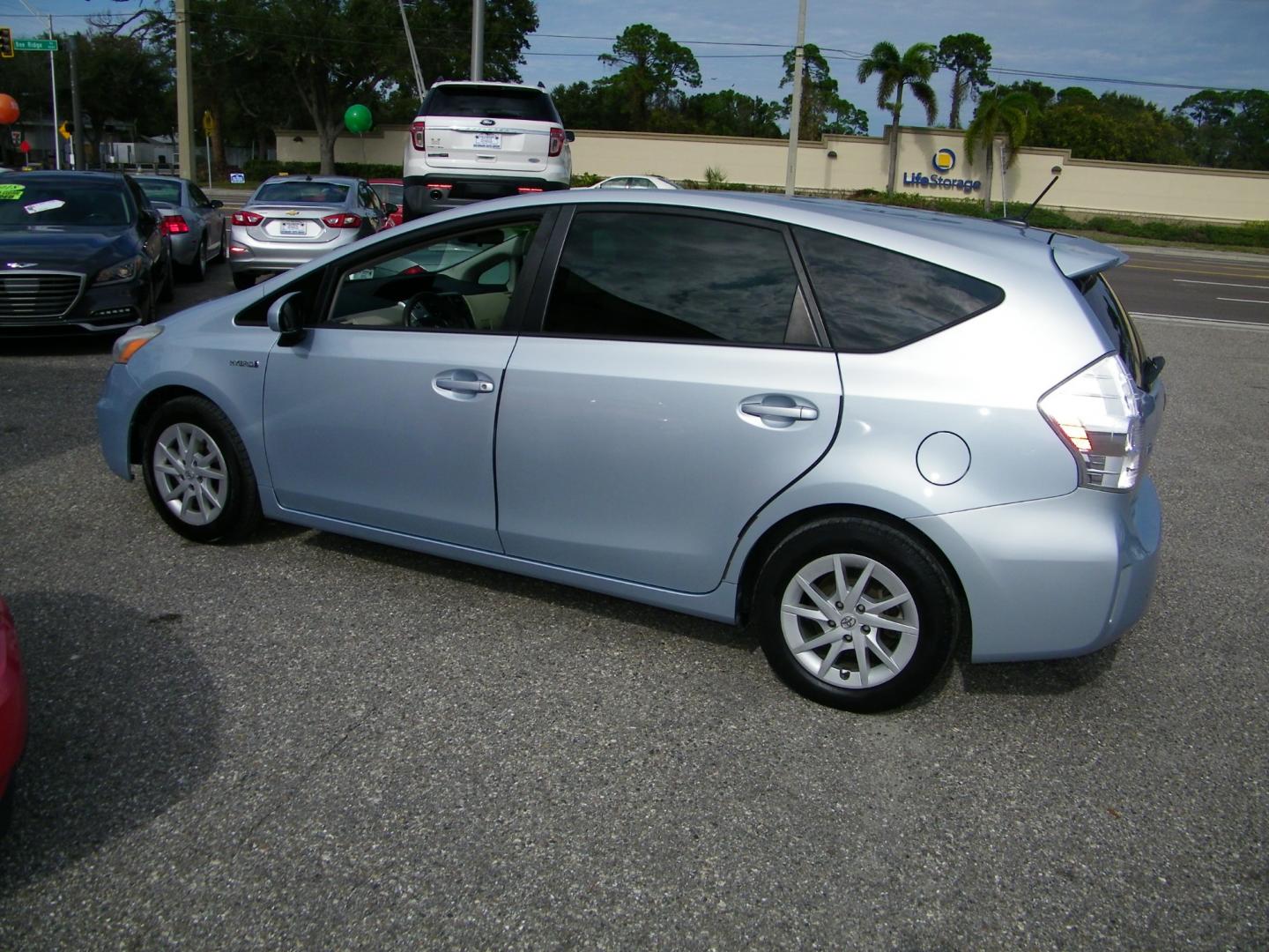 2013 Silver /Beige Toyota Prius V Three (JTDZN3EU5D3) with an 1.8L L4 DOHC 16V HYBRID engine, Continuously Variable Transmission transmission, located at 4000 Bee Ridge Road, Sarasota, FL, 34233, (941) 926-0300, 27.298664, -82.489151 - Photo#6